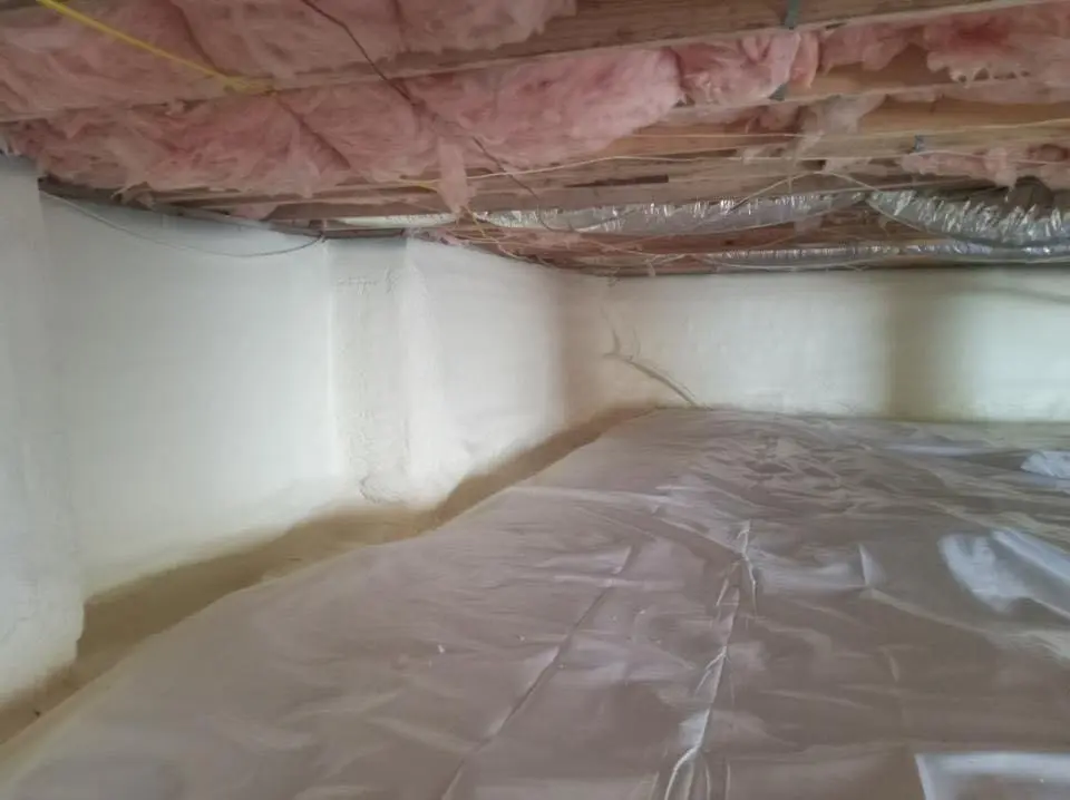 Crawl space encapsulation with closed-cell spray foam for Commercial Roof Restoration in Fall River